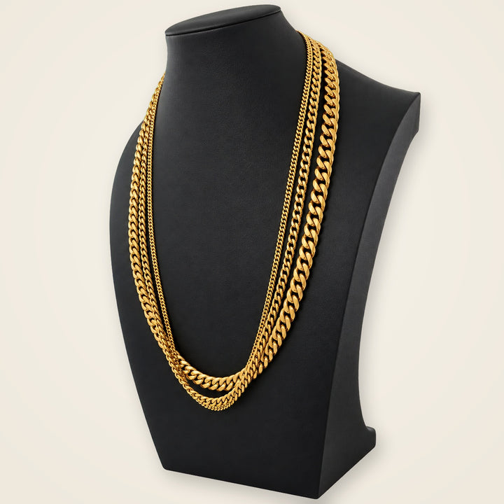 Three Cuban-chain sizing samples on a black display bust