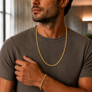 Cuban chain styled with a bracelet on a male model