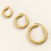 AI-retouched 10K yellow gold textured twisted hoop earrings in three sizes; one pair per selected size