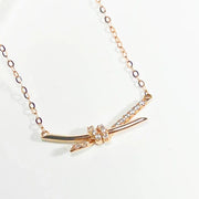 14K gold diamond knot necklace delicate rose gold chain with pave diamond knotted bar pendant