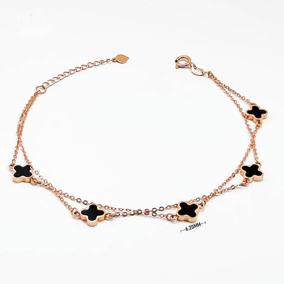 18K clover bracelet in rose gold double chain with five black enamel clover charms elegant dainty