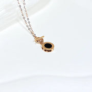 18K Roman clock necklace in rose gold with black enamel dial pendant on delicate chain