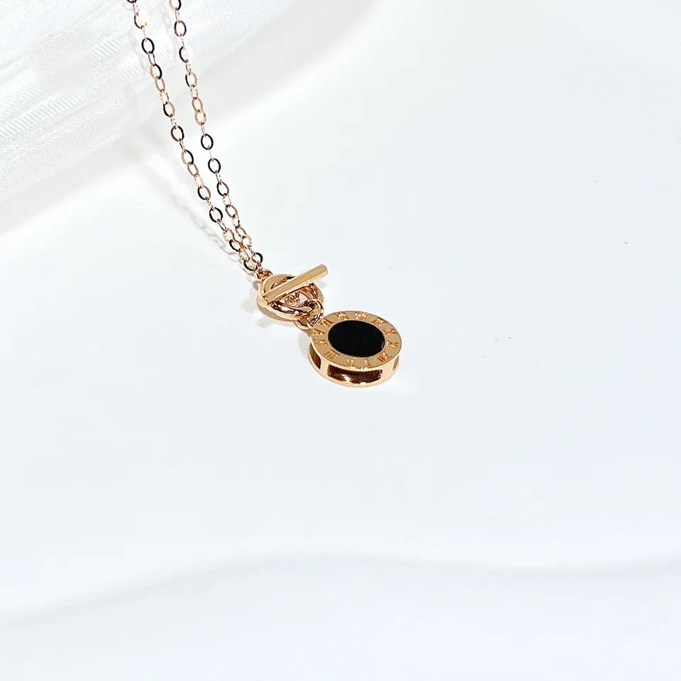 18K Roman clock necklace in rose gold with black enamel dial pendant on delicate chain